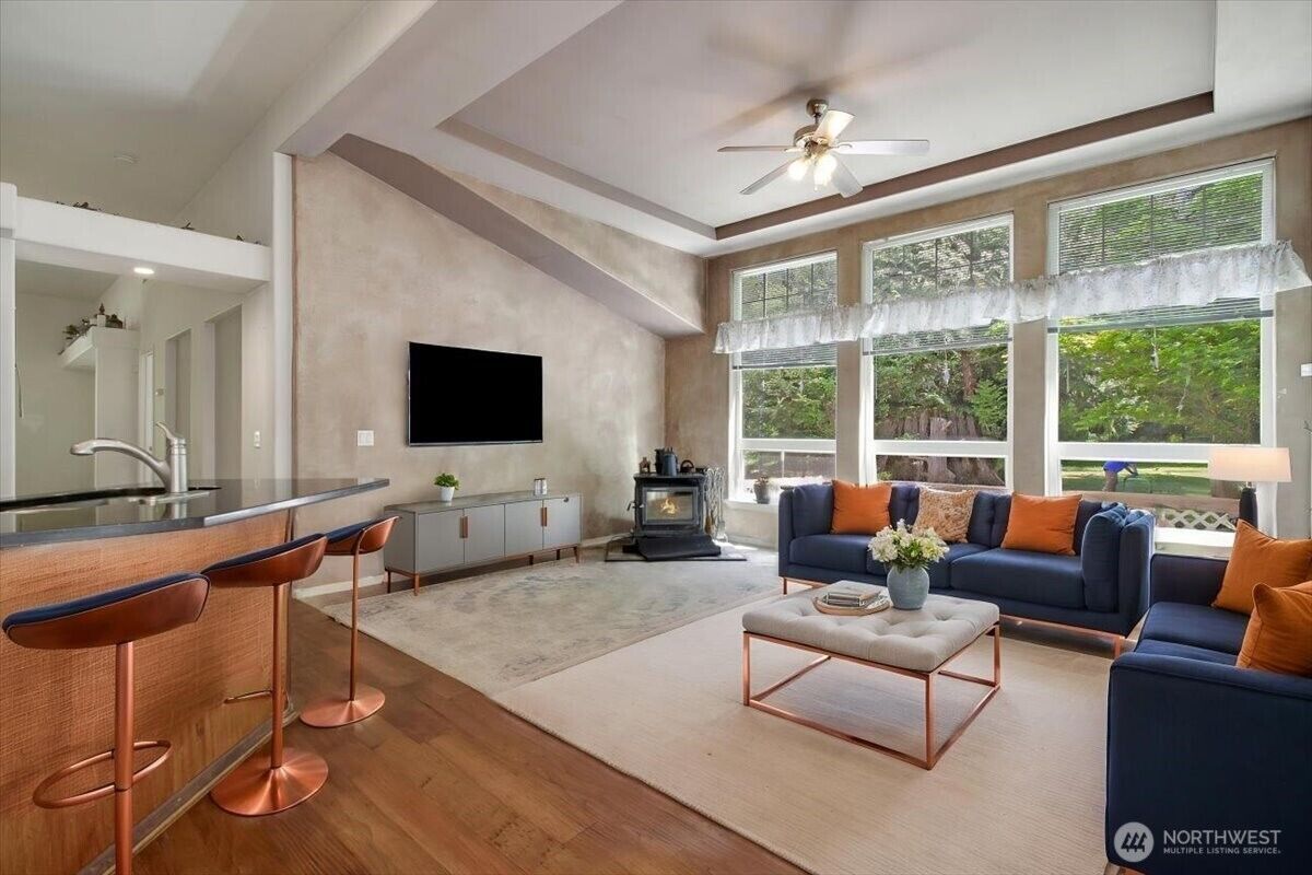Living room with wide windows to the yard