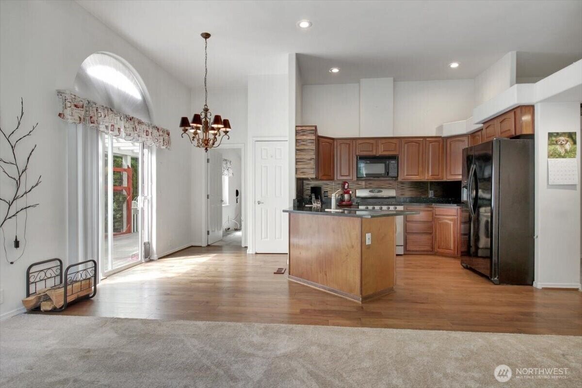 Vaulted entry and dining area