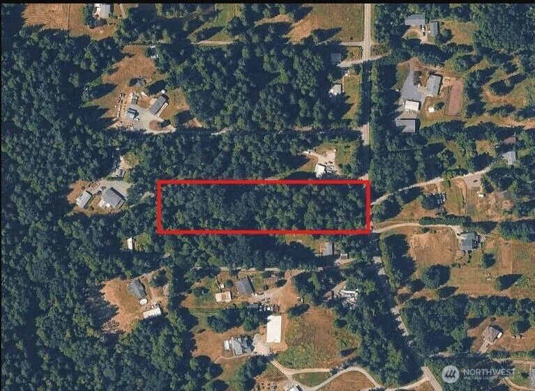 Aerial view of the 2.30 acre parcel at 16902 McElroy Road with the boundary outlined
